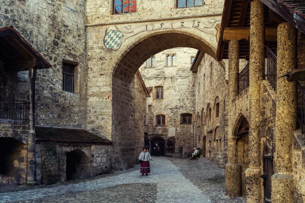 View of Burghausen walls from the inside with few people around. 