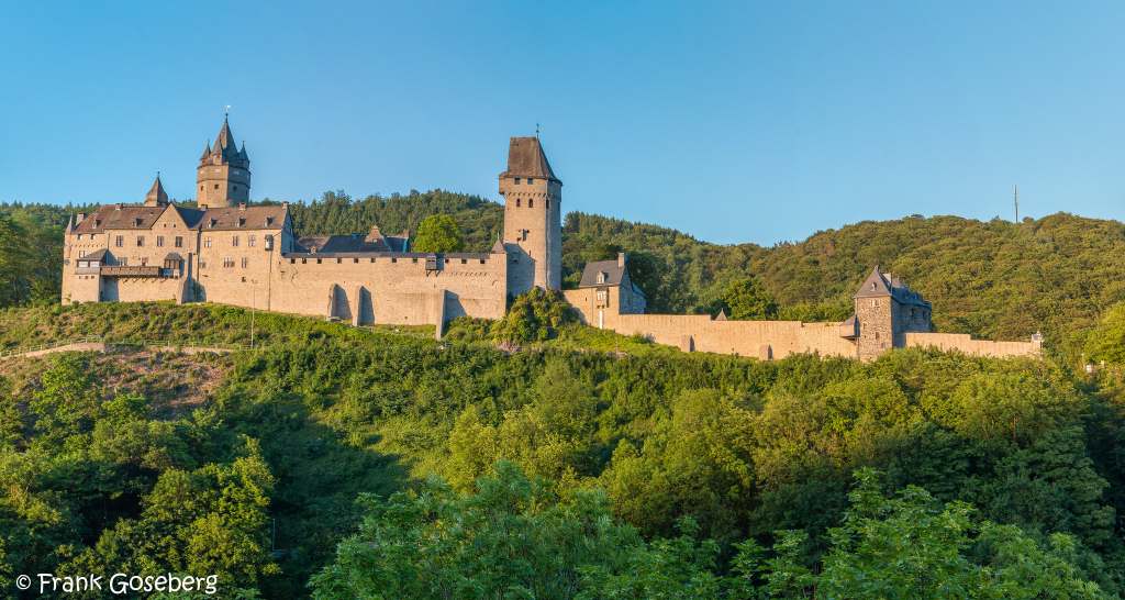 Altena Castle's beautiful view from afar surrounded by green trees