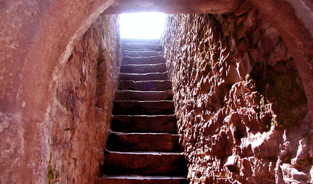 The Narrow rocky stairs of the Cahir castle. 