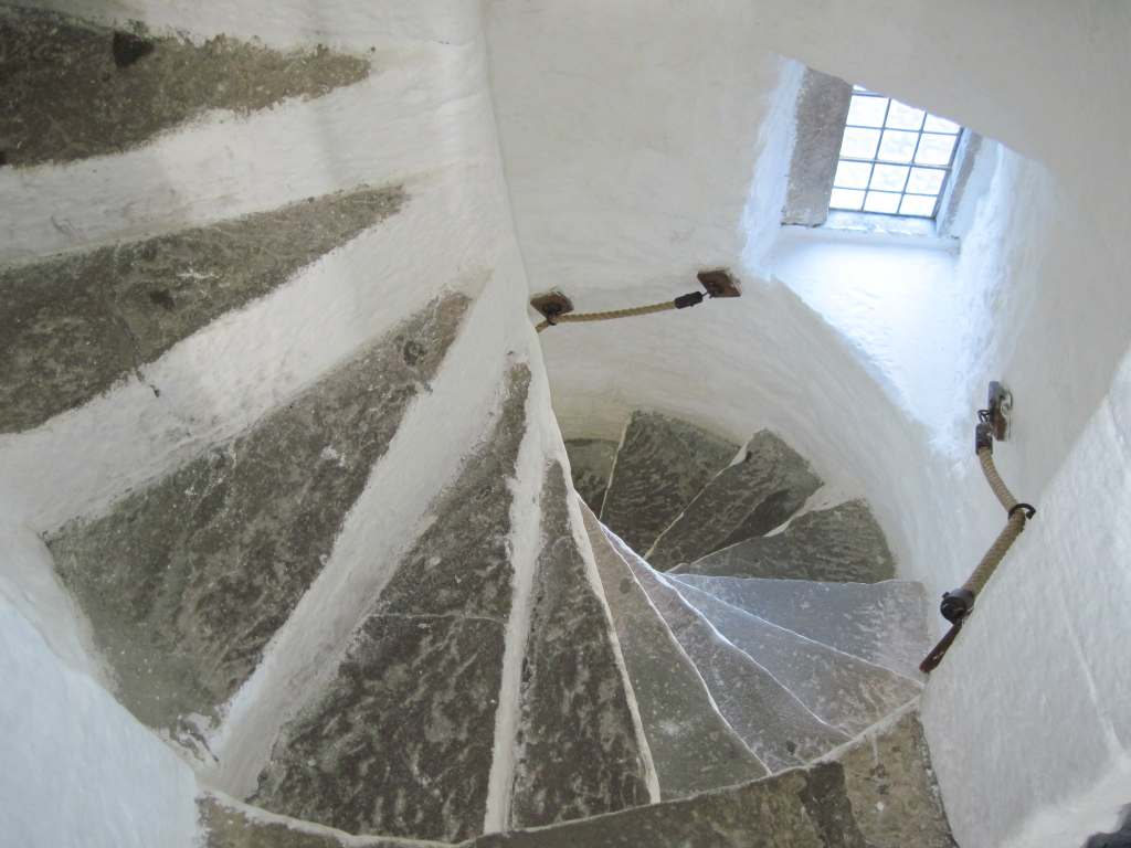 Spiral white staircase inside Cahir castle.
