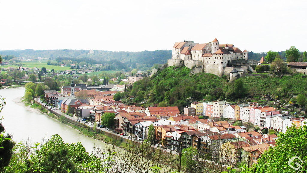 A stunning view of the Burghausen castle and its adjoining town near the river.