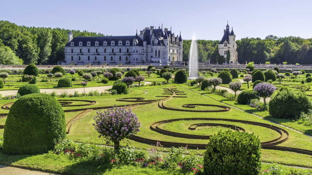 The stunning landscape garden with lush green grounds of the Château de Chenonceau.