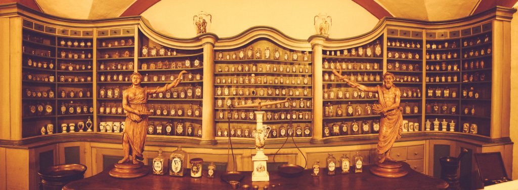 Heidelberg's Castle interior museum with shelf full of pharmaceutical artifacts,