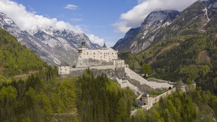 A picturesque fairy-tale view of Hohenwerfen Castle and its mountainous surroundings.