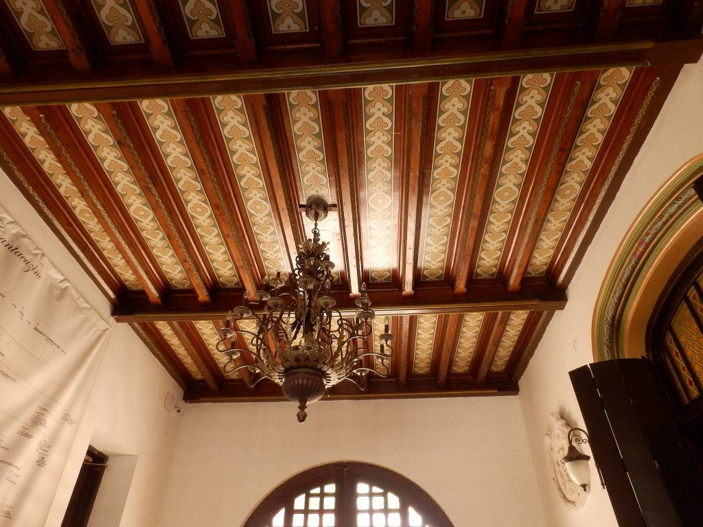 The original beamed wooden ceiling of Cantacuzino Castle.