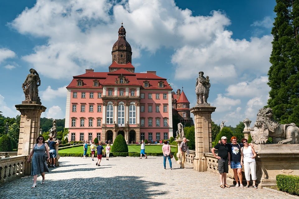 Ksiaz Castle surrounded by visiting tourists.