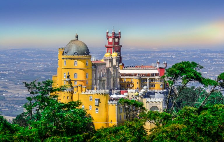 A picturesque view of Pena Palace in all its colorful glory.