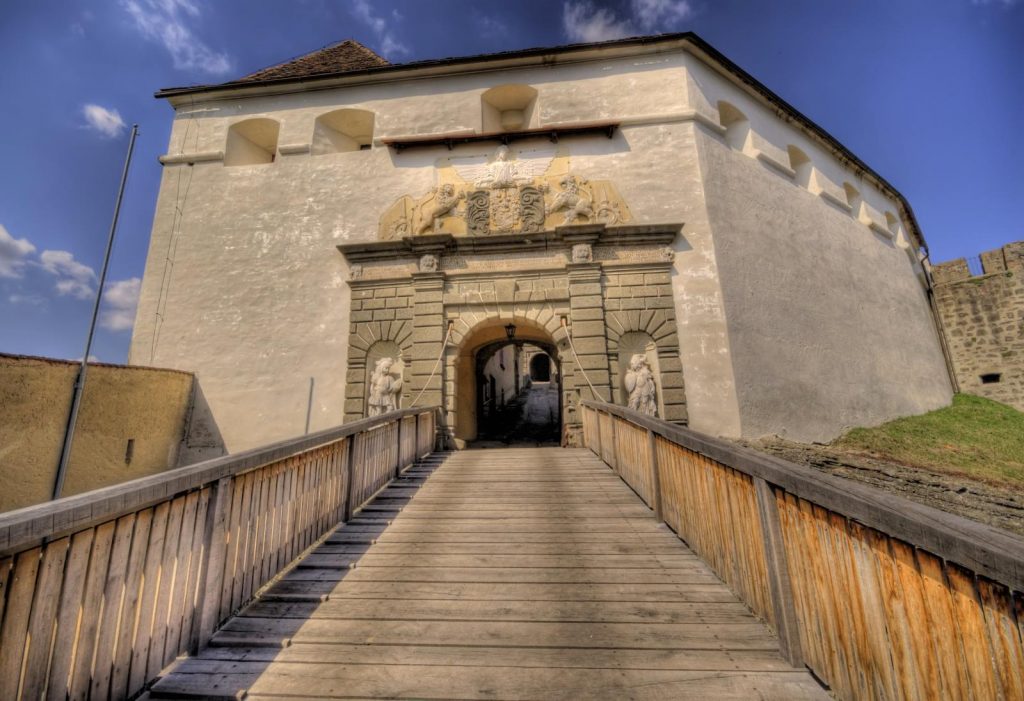 The wooden bridge that leads to the entrance of the castle.