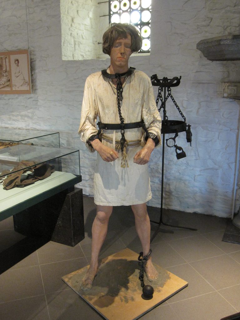 A human doll illustrating torture at the Museum of Torture Instruments in Gravensteen Castle.