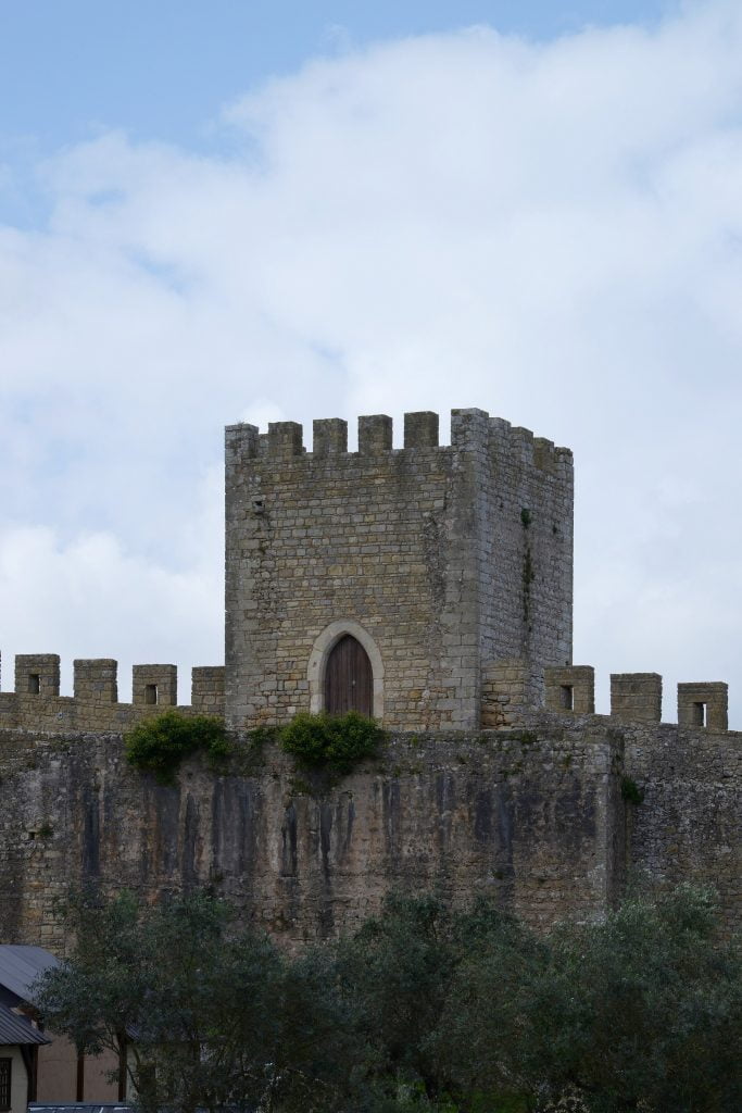 A closer look of the architectural structure of the Obidos Castle tower. 