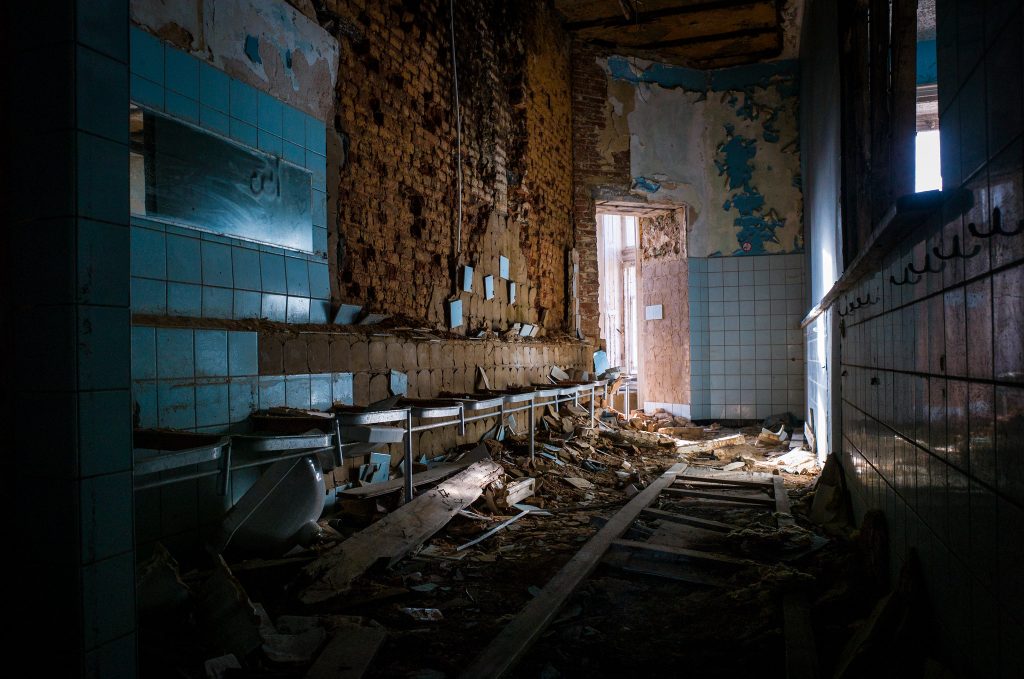 A crumbling camp-era bathroom inside Chateau Miranda, taken in 2014.