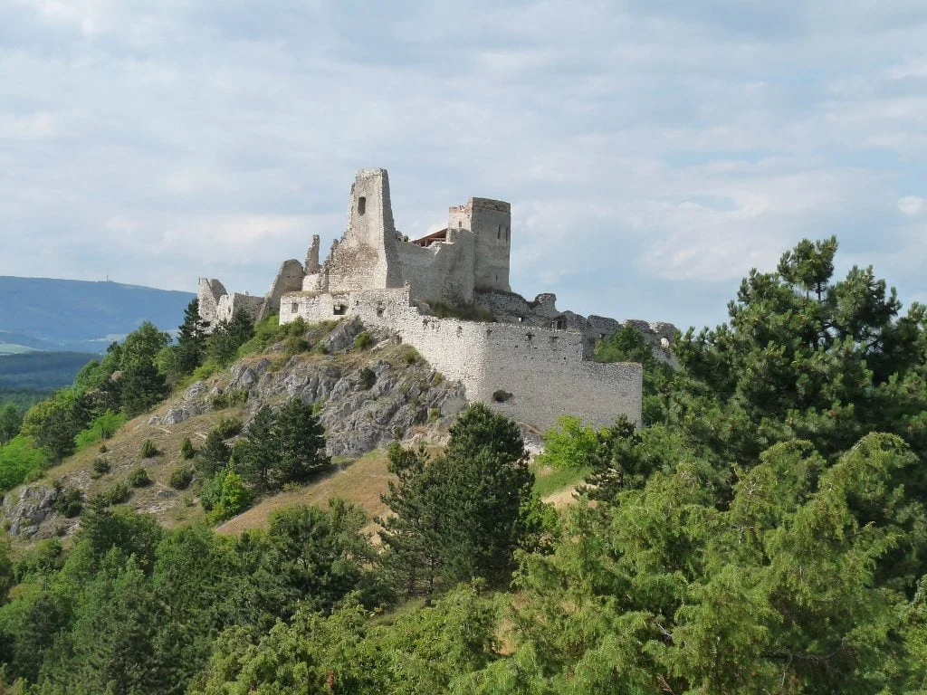 The mighty Cachtice Castle standing proudly on its mountainous perch.