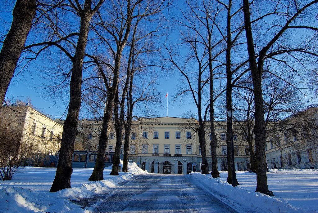 A panoramic view of the Palace of Oslo during winter.
