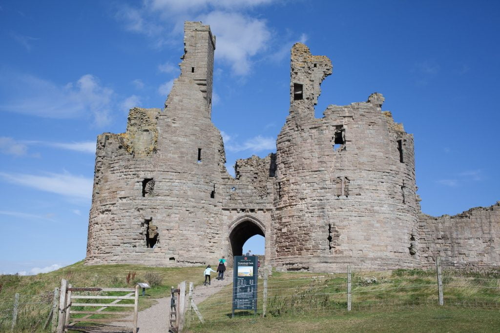 Visiting tourists on their way to Dunstanburgh Castle.