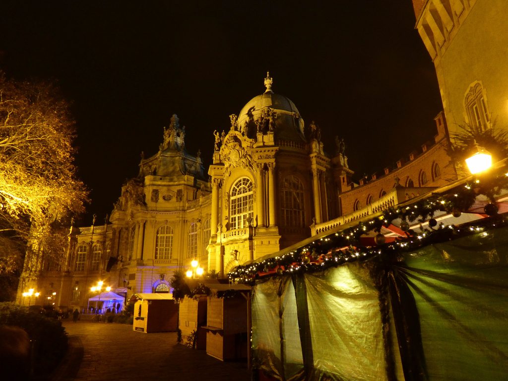 Outside Vajdahunyad Castle at night.