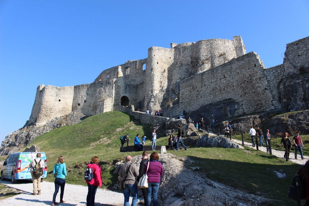 Visiting tourists around Spis Castle.