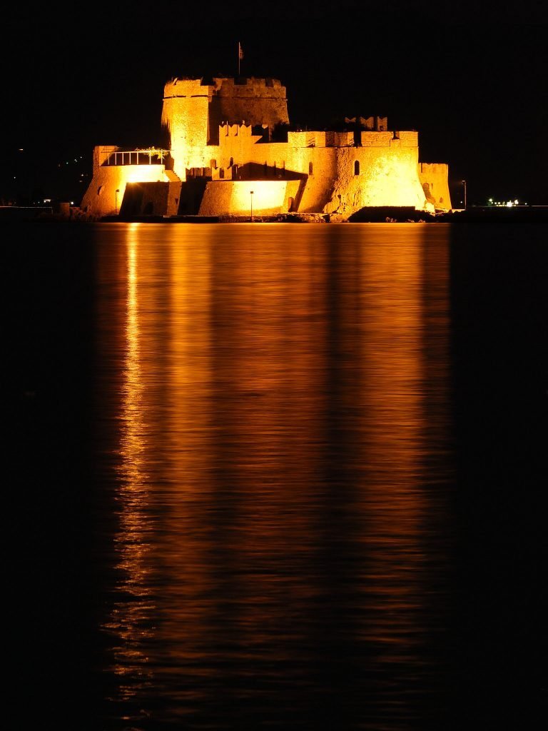The serene view of Castle of Nafplio from accross the water.
