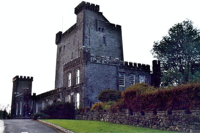 The view of the side of Knapppogue Castle along the road.