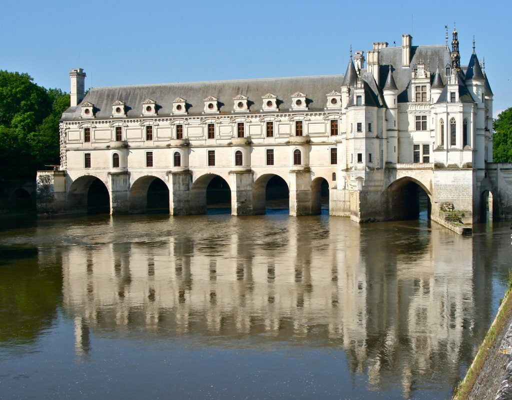 Chateau de Chenonceau standing on the river waters. 