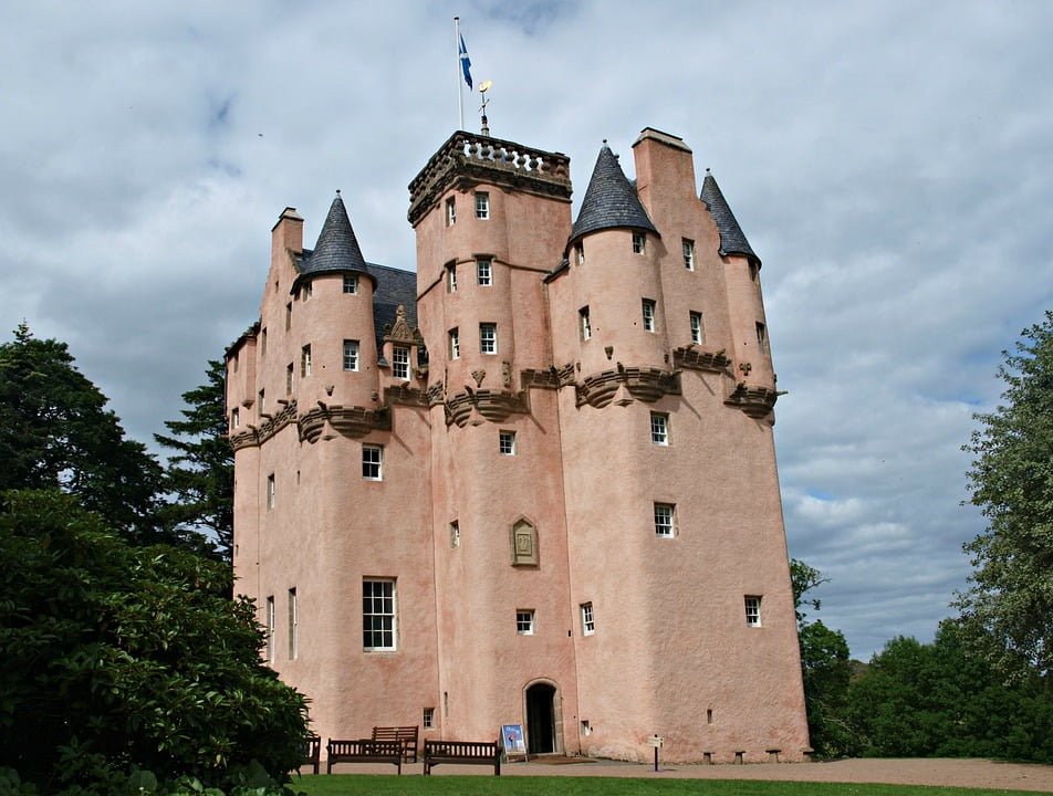 Craigievar Castle standing tall highlighting its beautiful  structure.