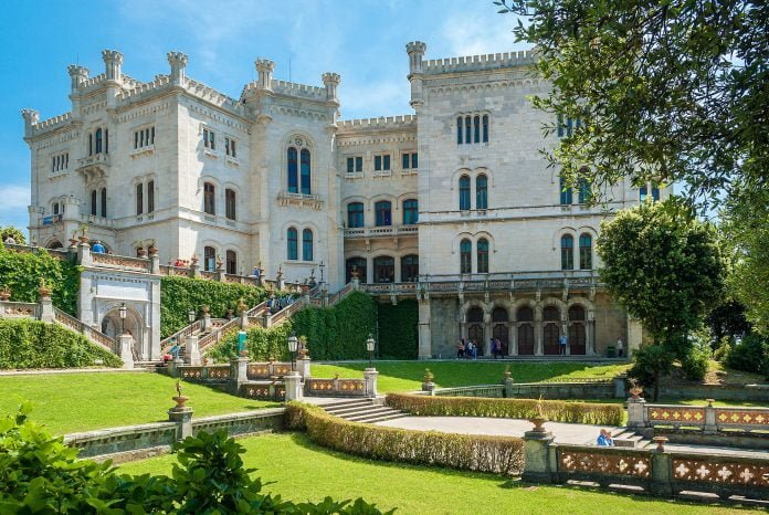 The beautiful gardens and facades of Miramare Castle.