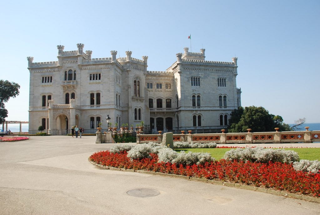 The entrance to Miramare Castle where you can also see the garden of flowers..