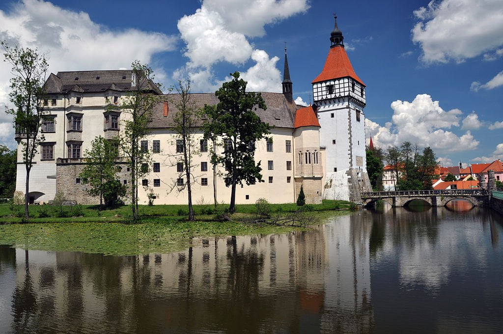 Gorgeous Blatna Castle encircled by water.