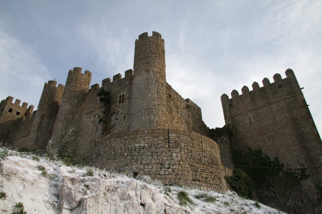 Worms-eye view of the walls of Castle of Obidos.