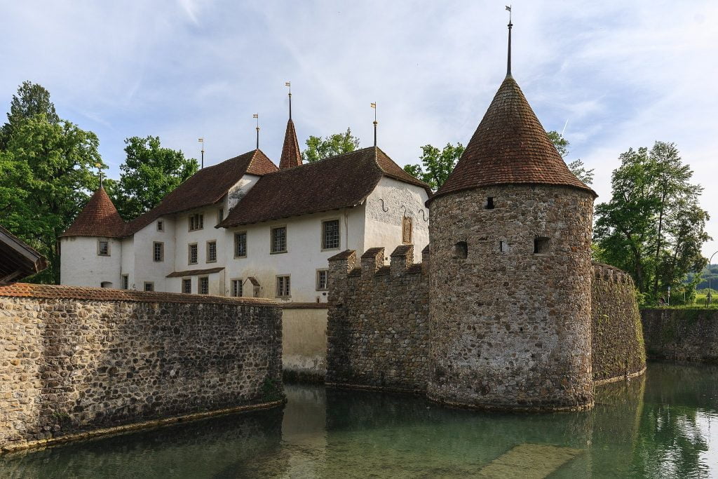 Hallwyl castle standing in the water.