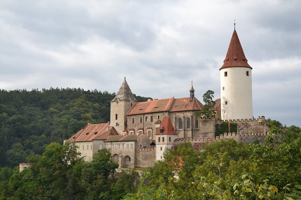 Křivoklát Castle among the trees.