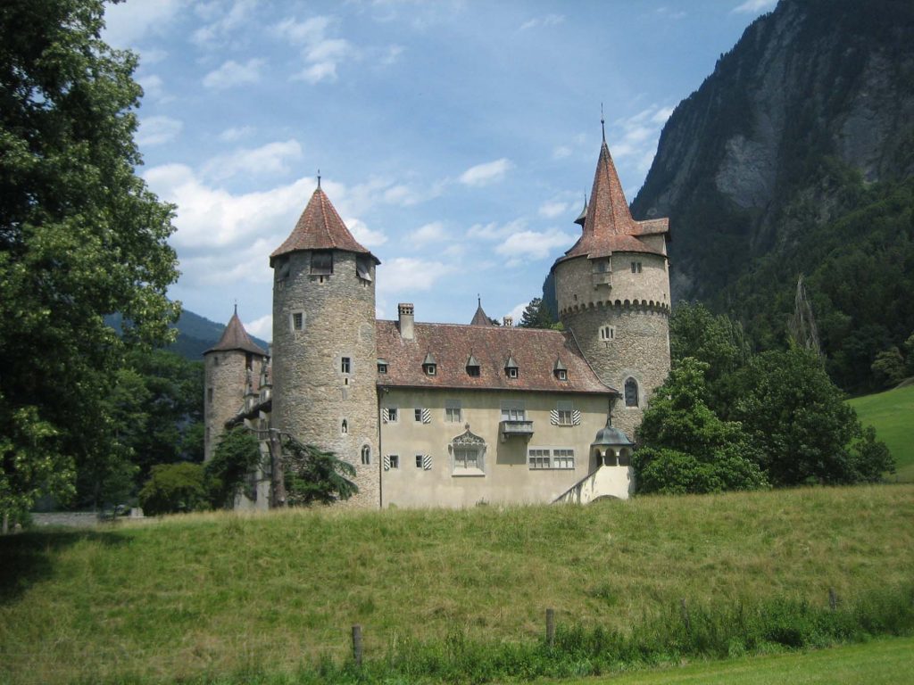 Marschlins Castle view from across the green field.