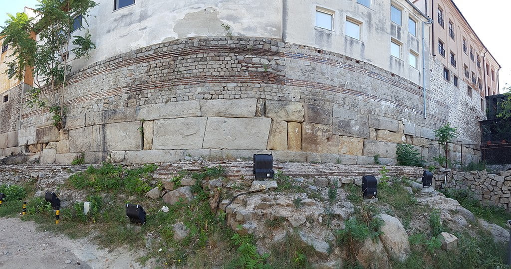 An ancient wall in Plovdiv city–still in use as the foundation for modern buildings.