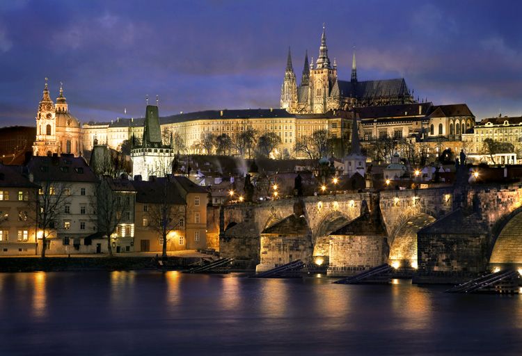 Prague Castle glowing in the night.