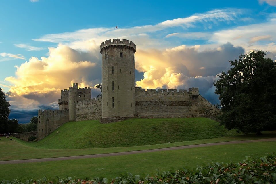 Warwick Castle against gorgeous clouds.