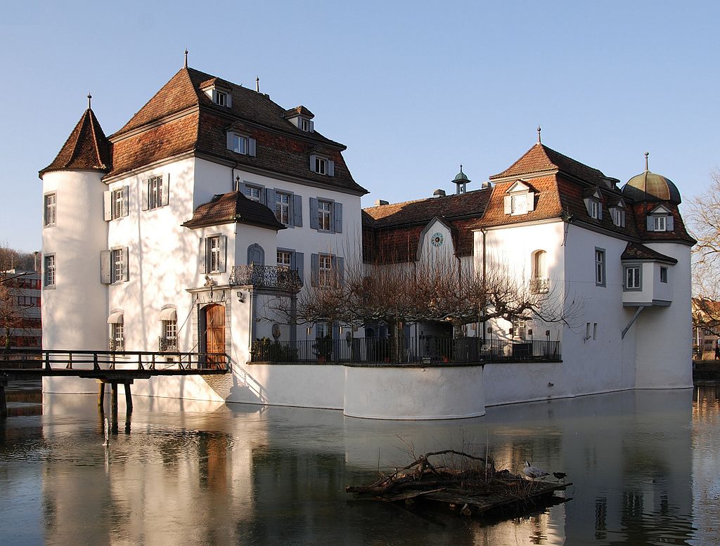 Bottmingen castle surrounded by water.