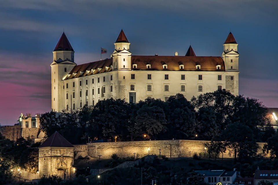 Bratislava castle lighted up at night.