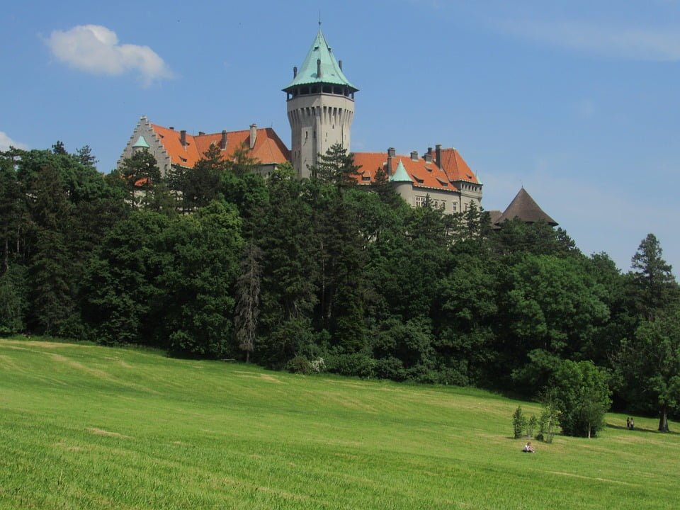 The view of Smolnice castle behind the trees. 