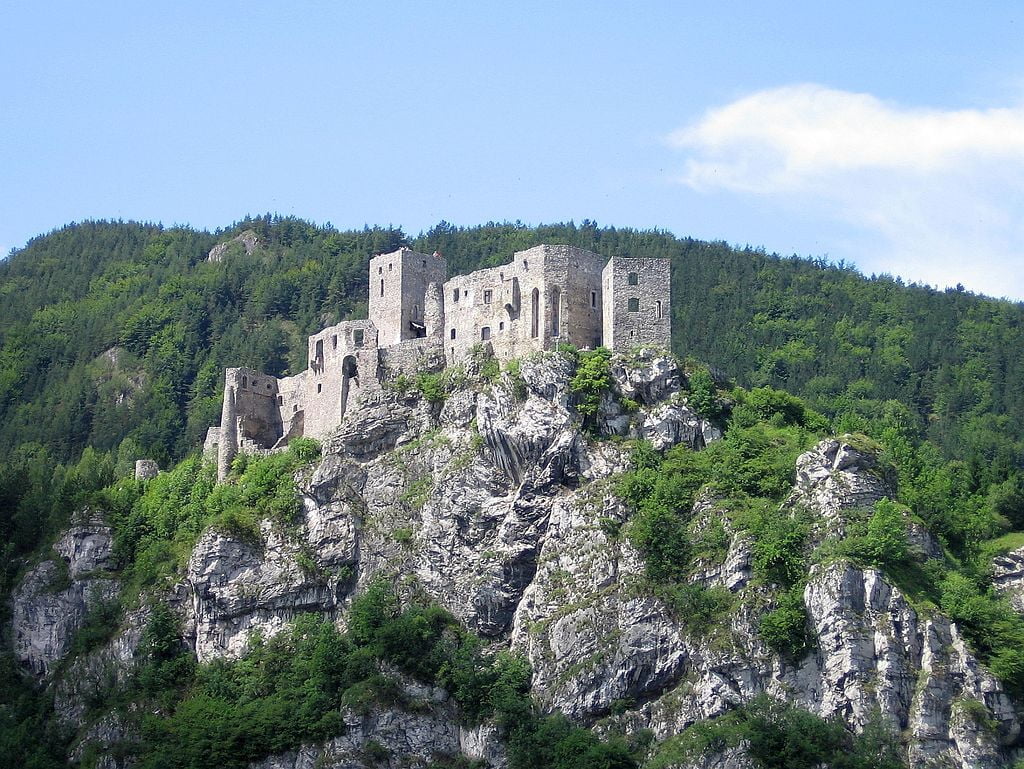 Strecno Castle standing at the edge of the cliff.