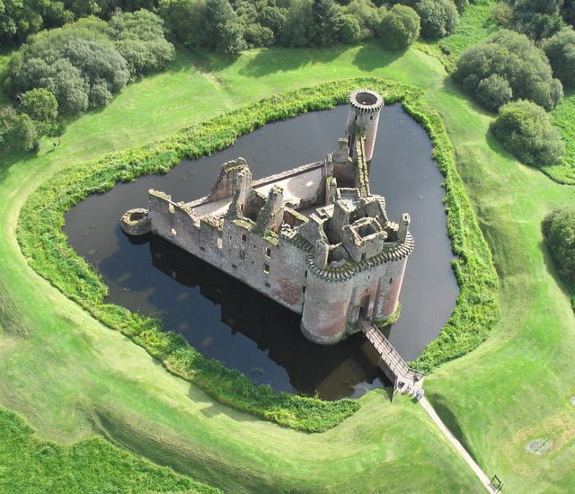 Caerlaverock Castle and moat from an aerial view. 