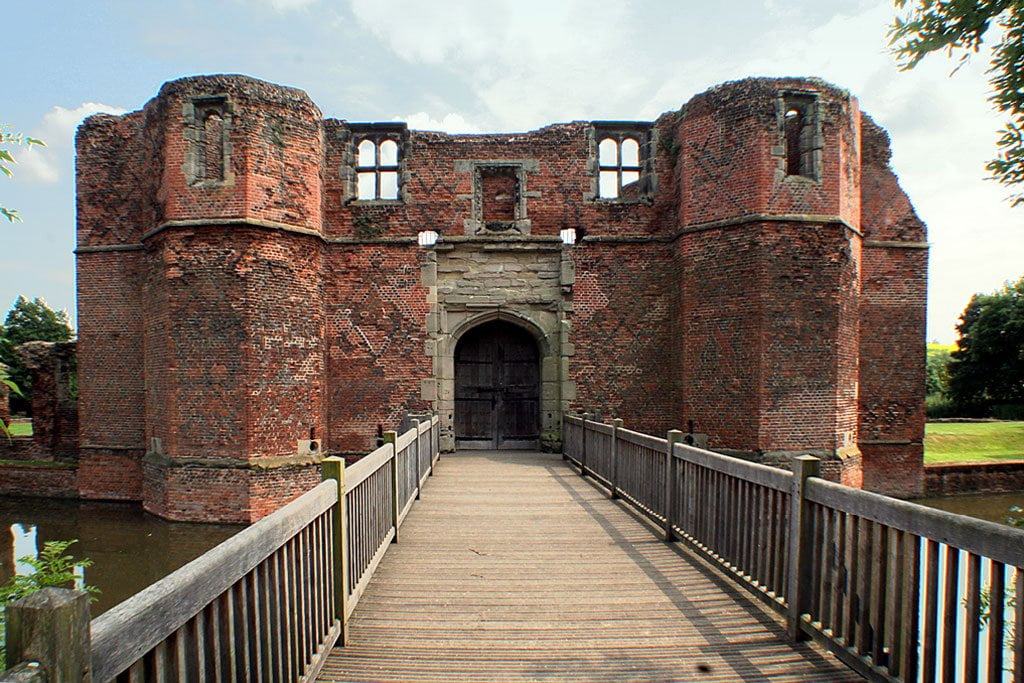 Castle gatehouse with wooden bridge.