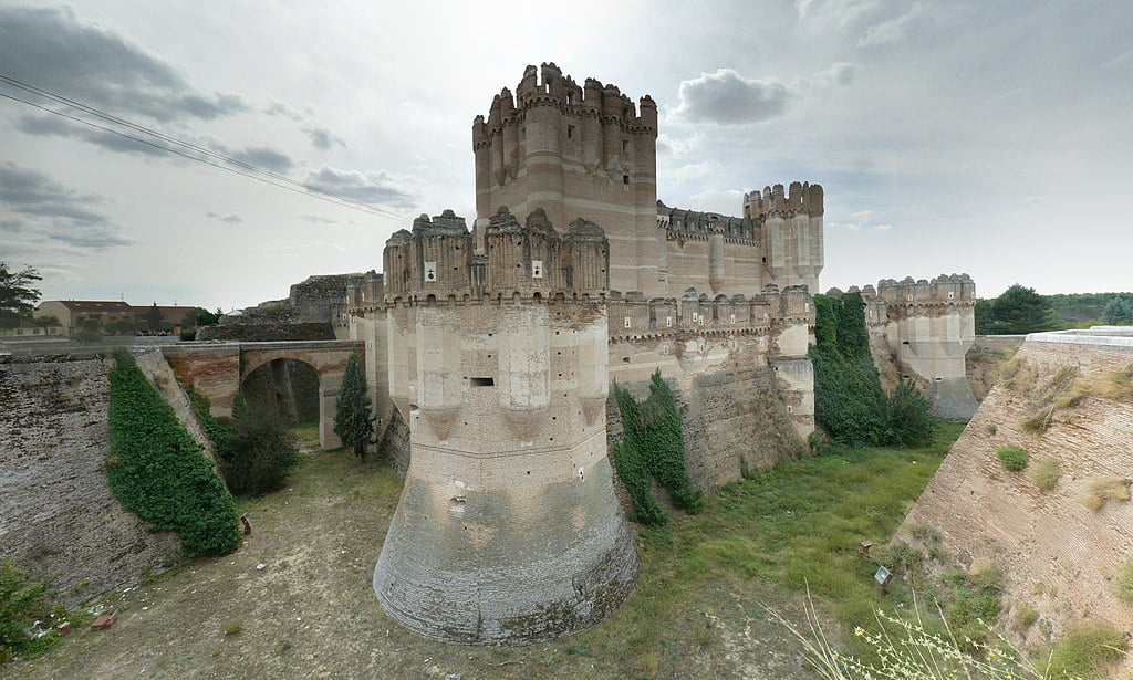 The formidable ditch moat and drawbridge entrance of Coca Castle.