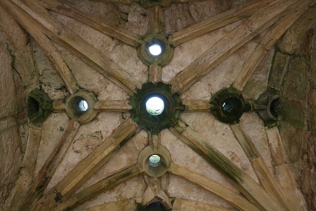 Murder holes in the gatehouse ceiling.