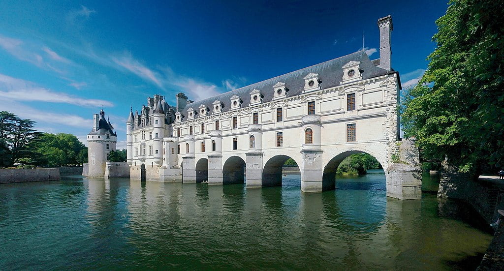 Chateau de Chenonceau resting on graceful arches over the River Cher.