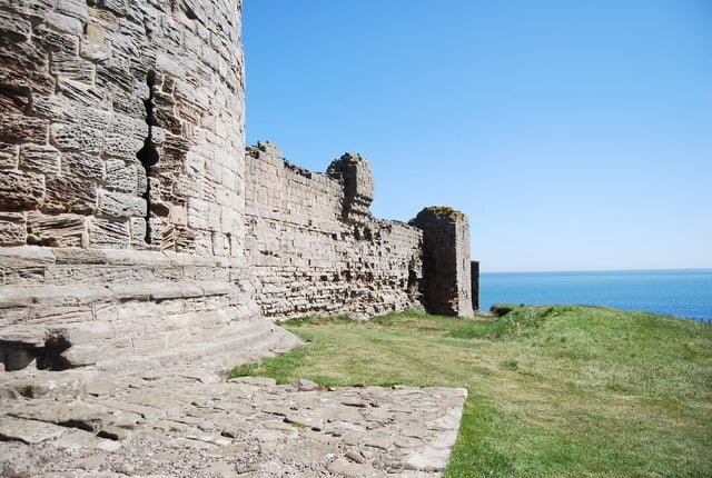 Curtain walls of Dunstanburgh Castle, England.