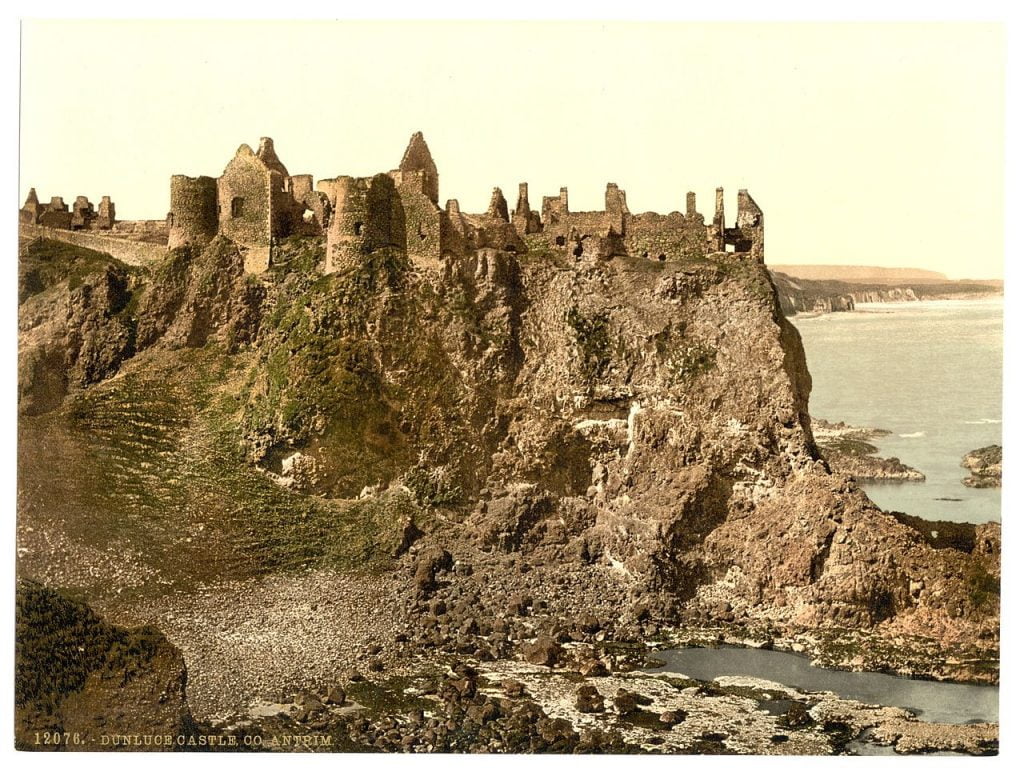An old photo of Dunluce Castle.