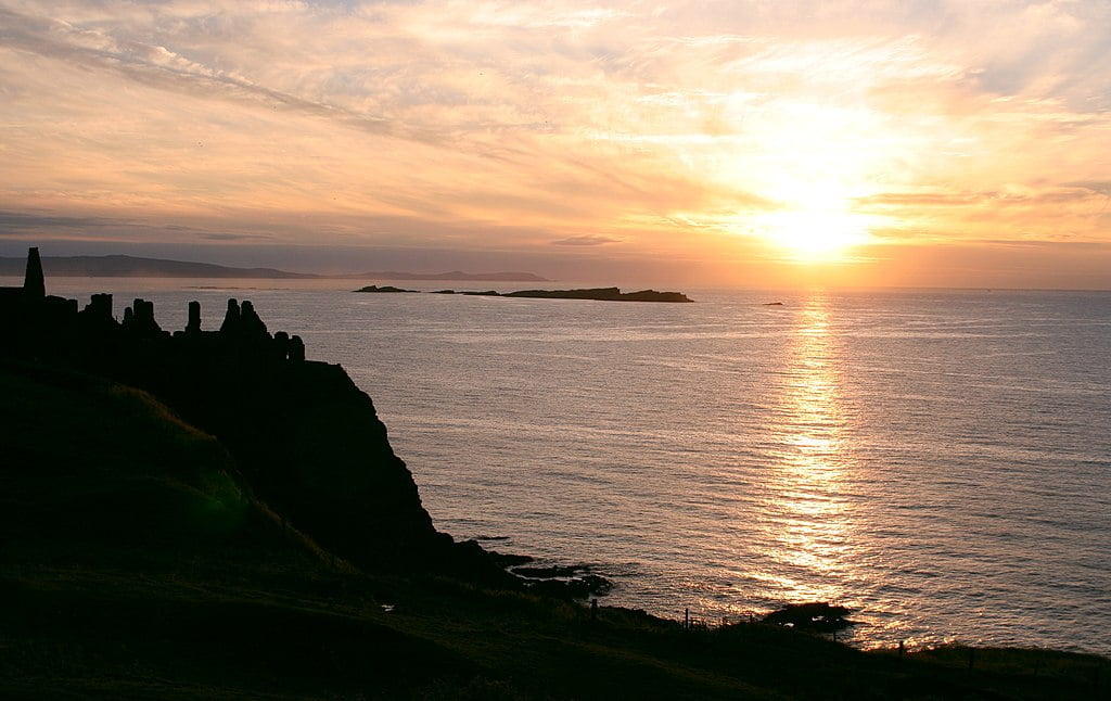 A scenic sunset at Dunluce Castle.