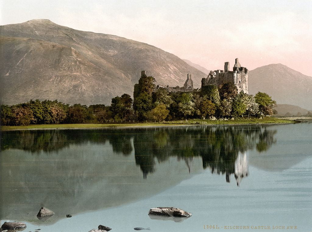 A view of Kilchurn Castle Two towers and a bridge