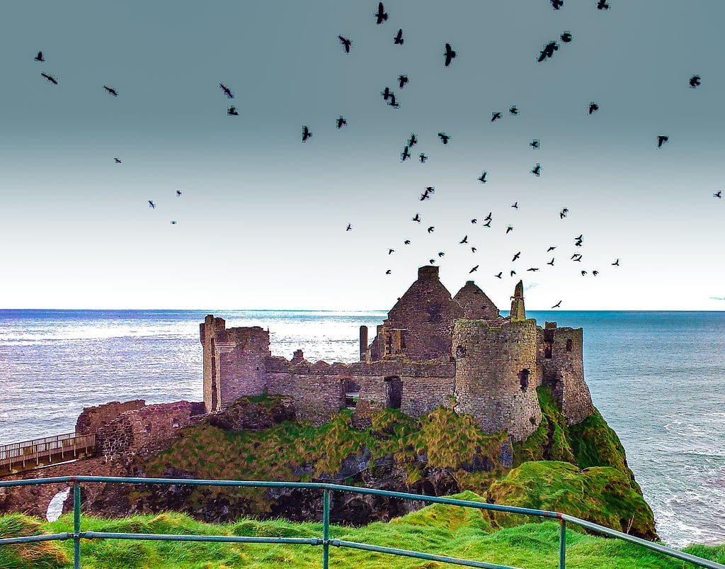 Dunluce Castle, overlooking sky and sea. 