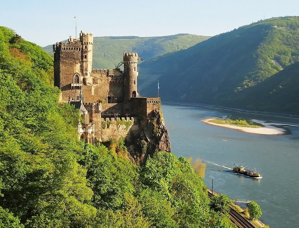 Rheinstein Castle standing tall over the River Rhine.