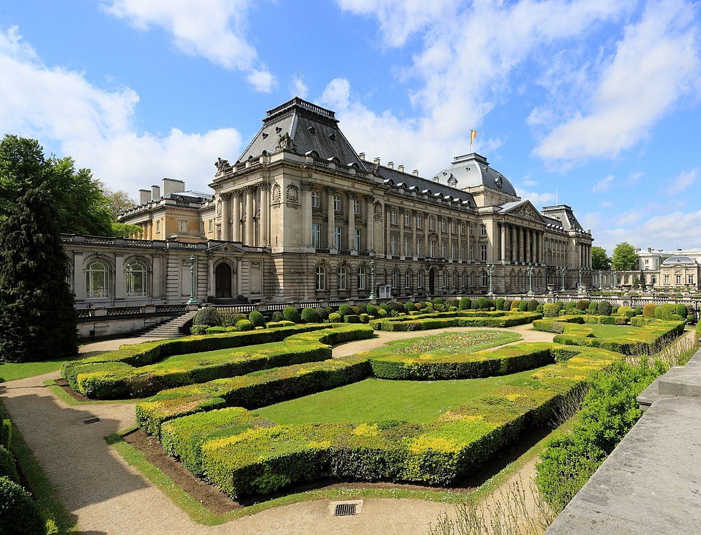 Detailed facades and gardens at the Royal Palace of Brussels.